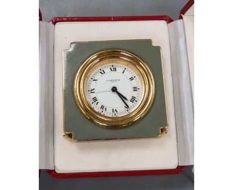 A Cartier travelling clock with box and papers