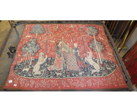 Hines of Oxford. A machine made tapestry - Lion and unicorn, with figures weaving, together with a wrought iron pole, H.128cm