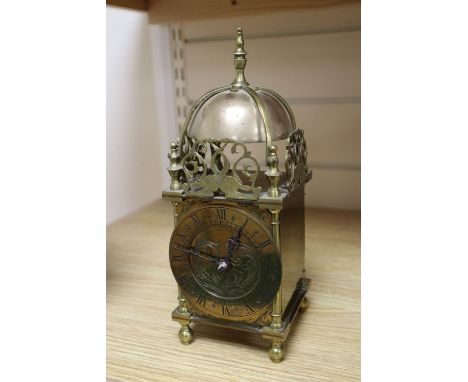 A mantel timepiece in the form of a brass lantern clock, height 26cm