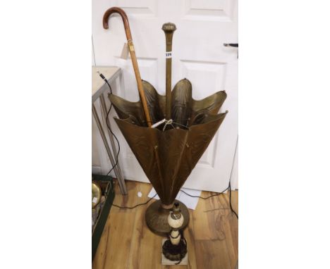 A brass umbrella/stick stand in the form of an umbrella and two other items, an ormolu-mounted alabaster table lamp and a wal