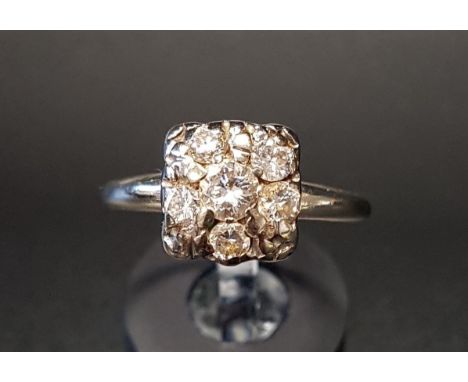 DIAMOND CLUSTER RINGthe diamonds totalling approximately 0.6cts, on fourteen carat white gold shank, ring size Q 