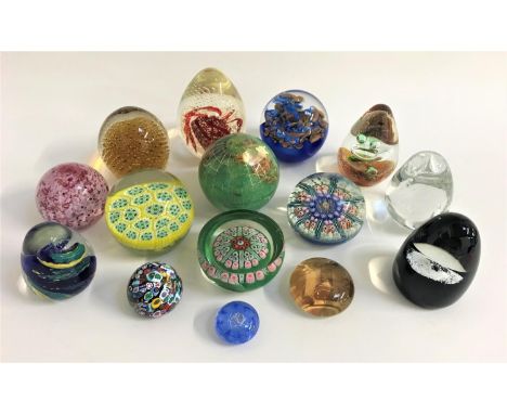 SELECTION OF FIFTEEN PAPERWEIGHTSincluding an Ekenas Swedish clear glass paperweight, a Caithness second marked CIIG, a Teign
