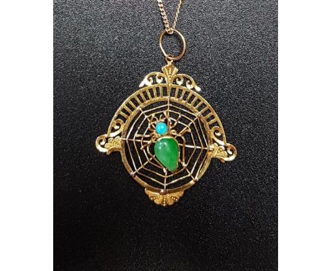 UNUSUAL JADE AND TURQUOISE SPIDER AND WEB DESIGN PENDANTthe stone set spider to the centre of the web below a pierced mount, 