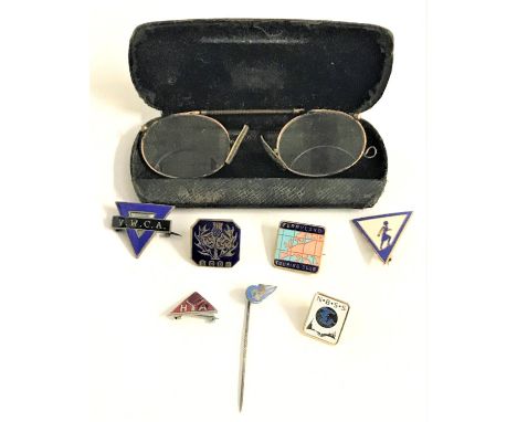 PAIR OF GOLD PLATED PINCE NEZ SPECTACLESwith bifocal lenses, cased, together with seven enamel lapel badges 