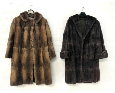LADIES BROWN MUSQUASH FUR COATwith side pockets and turned cuffs, together with a light brown musquash fur coat with side poc
