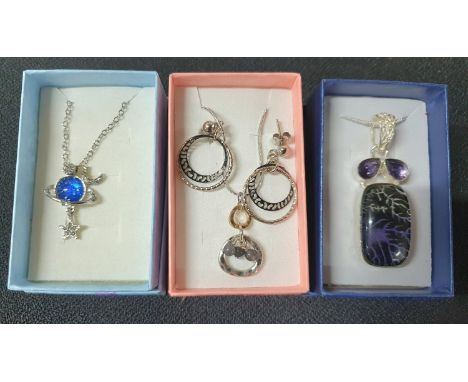 Three 925 silver chains with stone pendants, one with associated earrings, all in presentation boxes (3) 