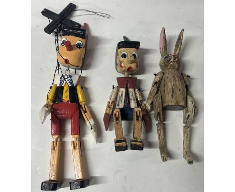 Pinocchio Puppet with another Pinocchio and rabbit wooden 