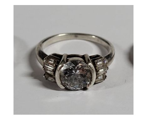 Two Silver rings and one other Ring (3)