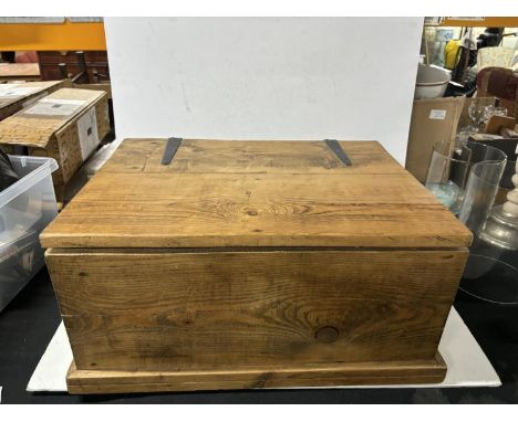 Wooden trunk with toys 