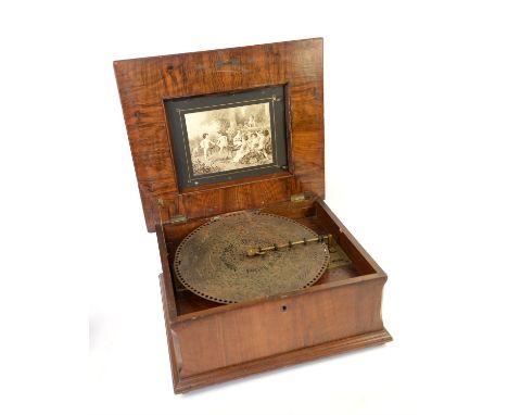Victorian walnut and inlaid table top polyphon, the cover inlaid with a panel of flowers and foliage, , the inside of the cov