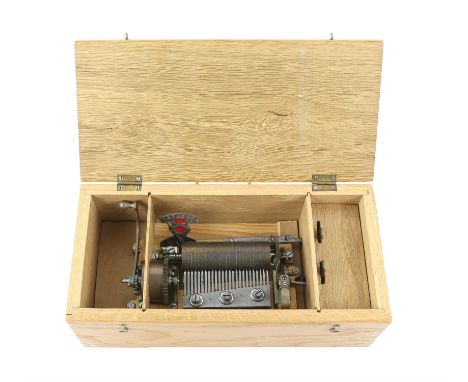 Late 19th/early 20th century musical box, brass barrel 9cm long, with winding handle, change/repeat and stop/play switches, r