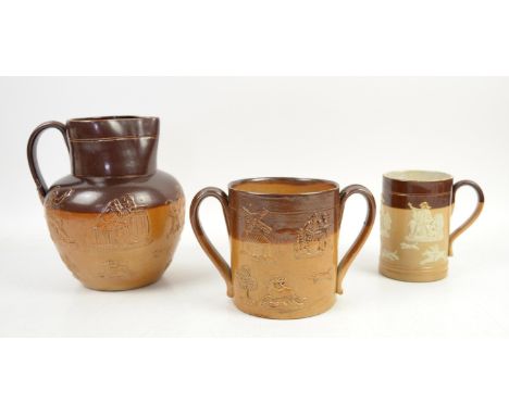 Doulton Lambeth stoneware hunting jug h21cm, a similar two handled jug and a mug, impressed makers marks and X2888 to the mug