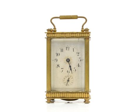 French brass carriage clock, the silvered dial with Arabic numerals and seconds subsidiary dial, on bun feet, with keys, stri