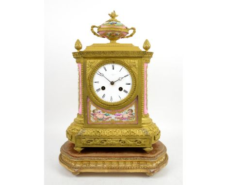 19th century French porcelain and ormolu eight day mantel clock, c.1870/1880, circular white enamel dial with Roman numerals,