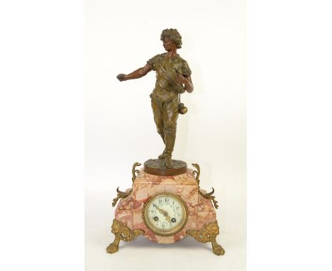 French rouge marble and spelter mantel clock  movement by F Martin clock with spelter figure of a boy, enamel dial, Arabic nu