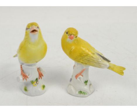 Meissen porcelain model of a canary on naturalistic tree stump, blue cross sword mark and impressed numbers to base, 20th cen