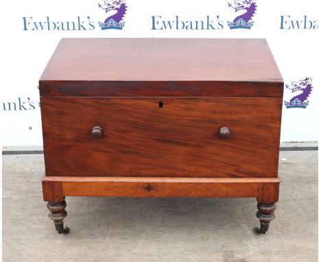 19th century mahogany trunk on stand, on turned supports and castors, H68 x W86.5 x D52.5cm 