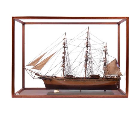Wooden model of the tea clipper Cutty Sark in full sail, in glass case, case size w122 x d42 x h84cm