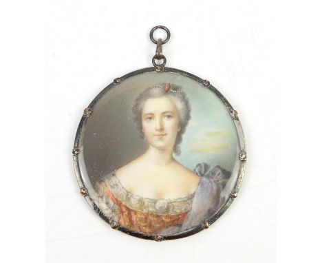 Late 19th/early 20th century portrait miniature on ivory depicting a lady in a dress with her hair up, 8cm diameter,PLEASE NO