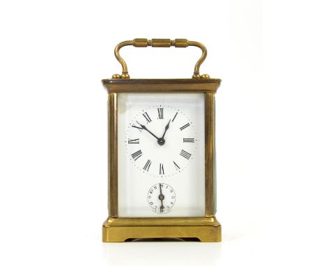 Early 20th century brass carriage clock, the enamel dial with Roman numerals and subsidiary dial, striking on a bell, 10.5cm 