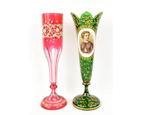 Bohemian red glass vase with floral painted decoration, h34.5cm, and a green glass and gilt decorated tulip form portrait vas