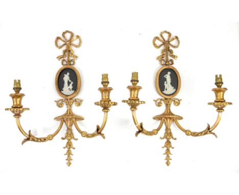 Pair of cast brass two light wall sconces with oval cameo plaques, purchased from W. Sitch & Co Ltd 45cm 