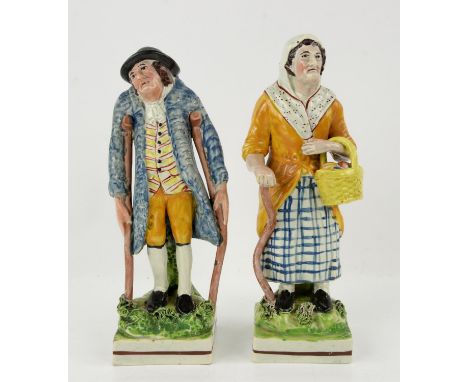 Staffordshire porcelain pair of figures, a man on crutches and woman with a walking stick,  h21cm