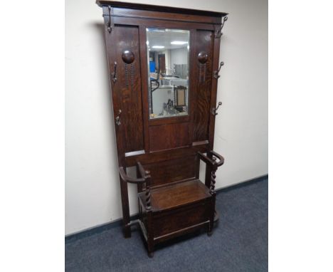 An Edwardian oak hall stand 