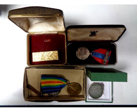 A collection of miscellaneous to include two World War I medals, one on ribbon, a crown in silver mount, a Royal mint, a full