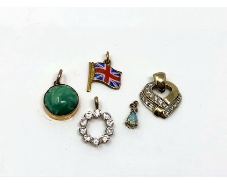 A yellow gold Union Jack enamel charm together with other yellow gold pendants including opal and diamonds etc.