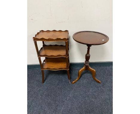 A mahogany three tier occasional stand together with a mahogany wine table 