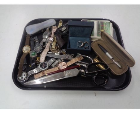 A tray containing miscellaneous to include dressmaker's scissors, assorted watches, silver rings, cap gun etc.  