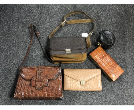 A vintage ostrich leather purse by Corbeau, together with an elephant leather handbag, a crocodile leather purse and similar 