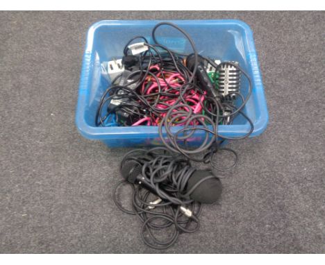 A box containing vintage style microphone marked GM55, three other microphones and a quantity of cables for musical instrumen
