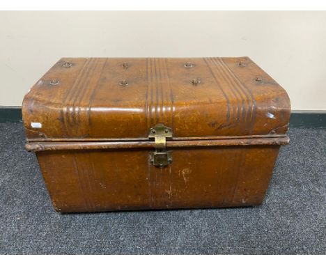 An early 20th century tin trunk 