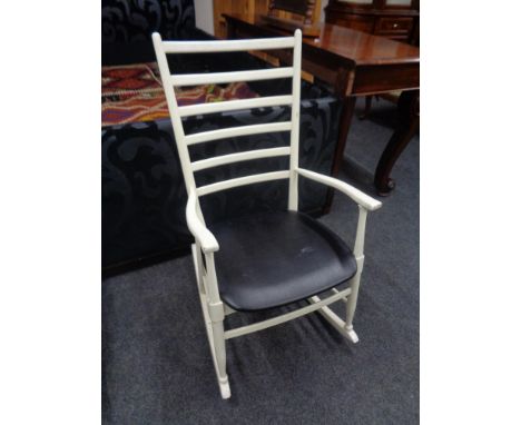 A painted 20th century ladder back rocking chair.  