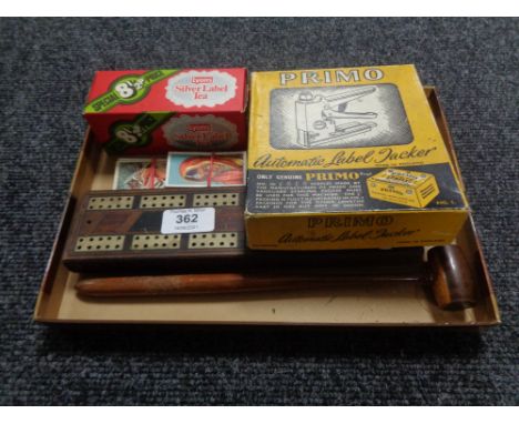 A small quantity of collectors items to include a sealed box of Silver Label Tea, cribbage board, wooden gavel, Primo automat