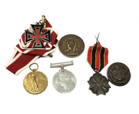 A collection of First and Second World War medals including one to Coldstream Guards overseas service badge, silver enamelled