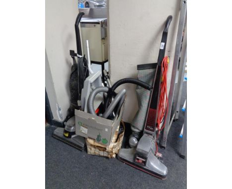 Two vintage Kirby vacuums together with a large quantity of accessories.  