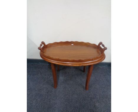 A twin-handled butler's tray on stand 
