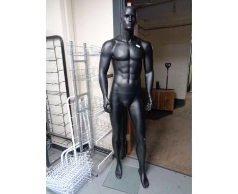 A male shop mannequin on stand (black).  