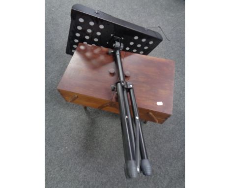 A 20th century concertina sewing box together with an adjustable music stand.  