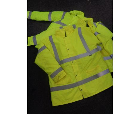 A twin site light together with a box containing high vis coats.  