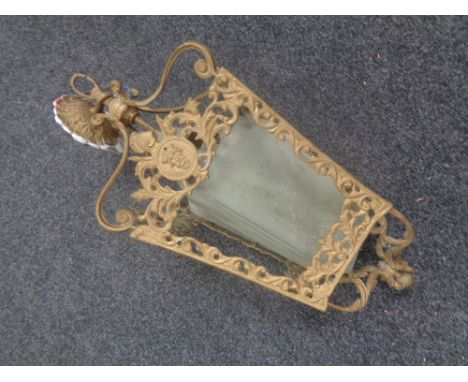 An antique brass hanging light fitting with etched glass shades (as found).  