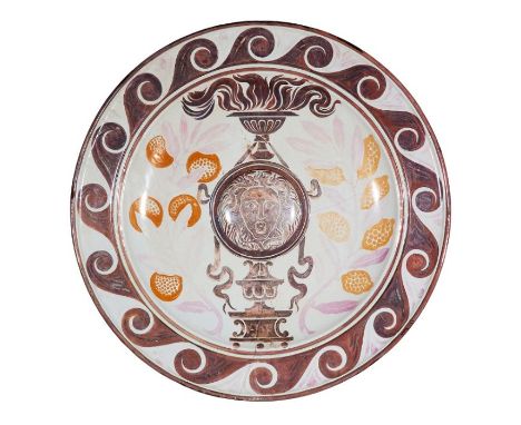 A monumental Victorian Arts & Crafts lustre wall charger by Maw & Co, BroseleyGlazed in purple, pink and orange on a white gr