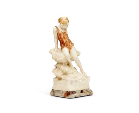 An early 20th century Italian alabaster figural lamp fashioned as a girl in a bathing suit seated on rocksIn cream and brown,