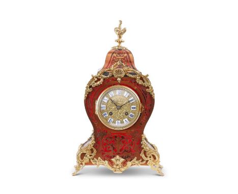 A late 19th century Louis XIV style scarlet-tortoiseshell and brass inlaid mantel clock Applied with gilt metal mounts, of ca