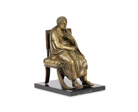 A late 19th century polished bronze figure of a seated Roman EmperorOn a black marble rectangular base, 24cm high. 