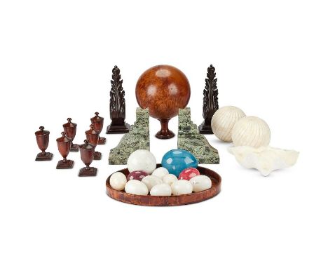 A group of decorative objects
Including a thuya wood tray, 33cm wide and sphere on stand, 28cm high, mineral eggs, alabaster 