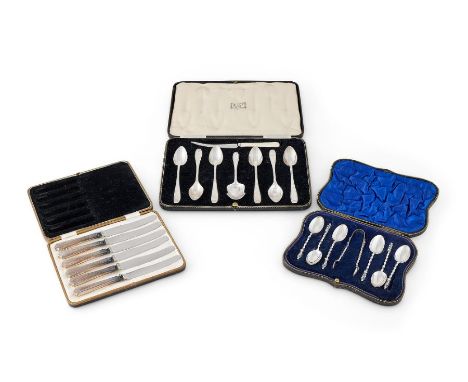 A set of six Apostle end tea spoons with matching sugar tongs by William Hutton & Sons Ltd, Sheffield, 1914, the tongs 1911Wi